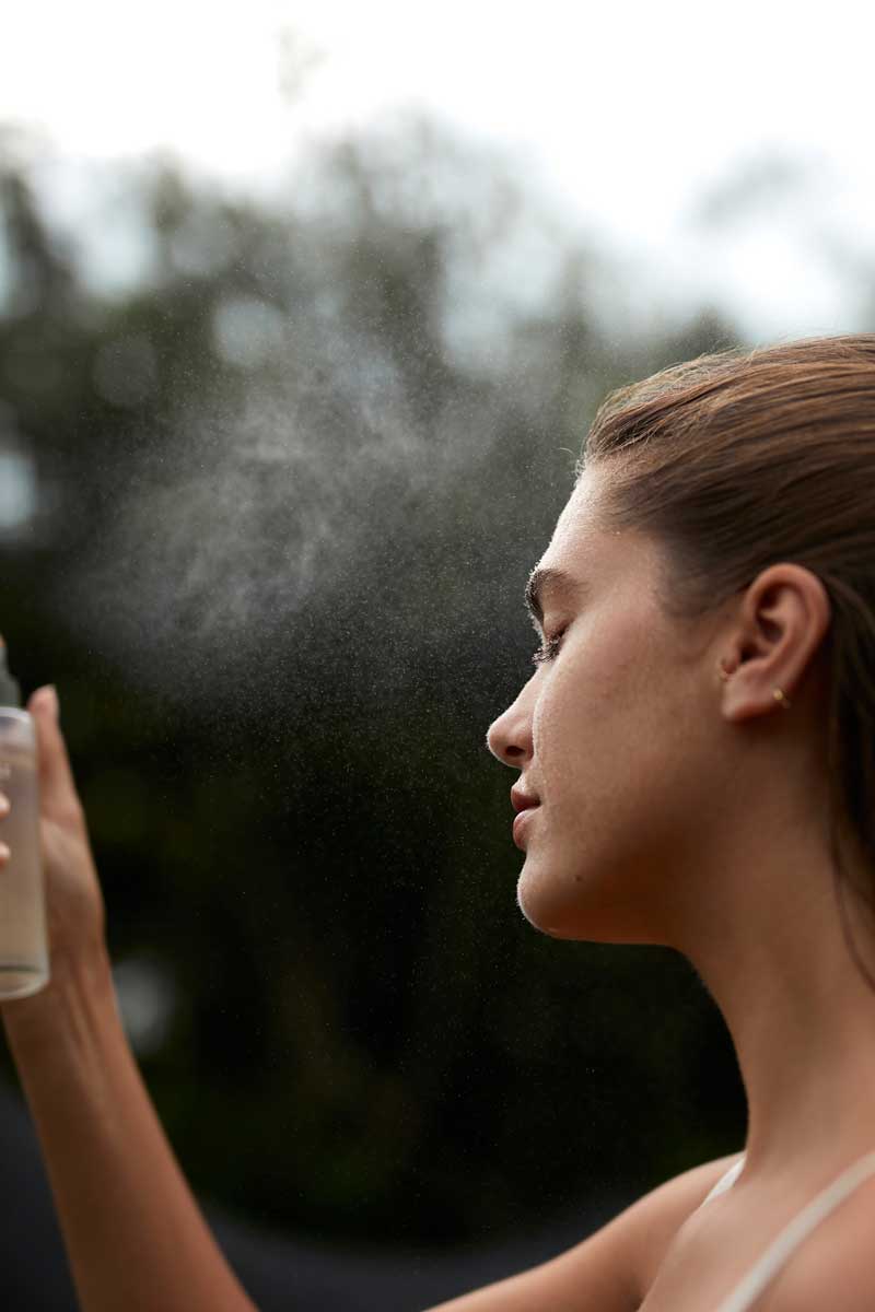 picture of a woman using fields of yarrows product in her routine for rosacea