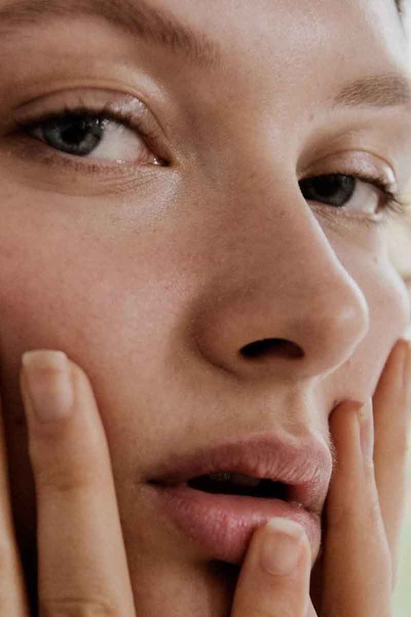 image of a woman concerned for her skin