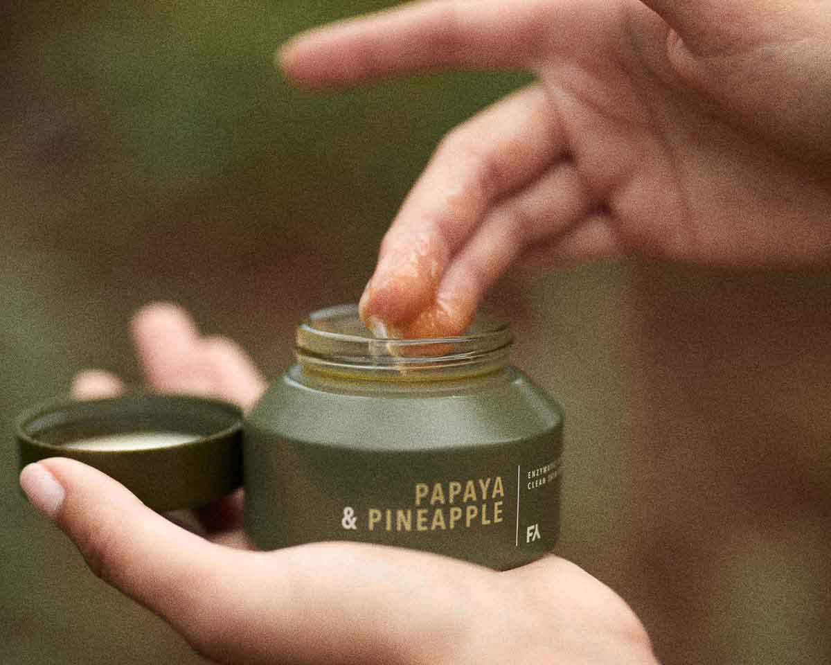 cover image of the article breaking down greenwashing about truly sustainable skincare showing fields of yarrows product being used