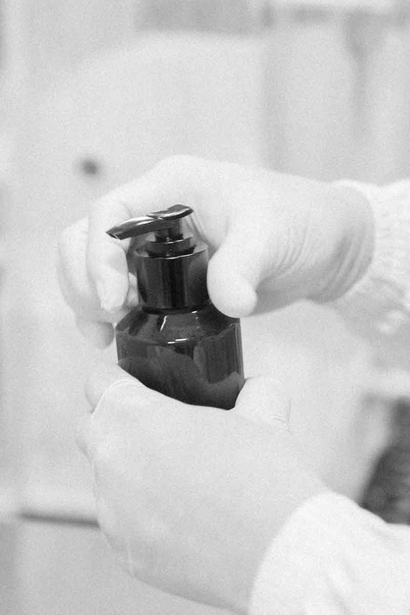Image of a Fields of Yarrow product being bottled in the pharmacy