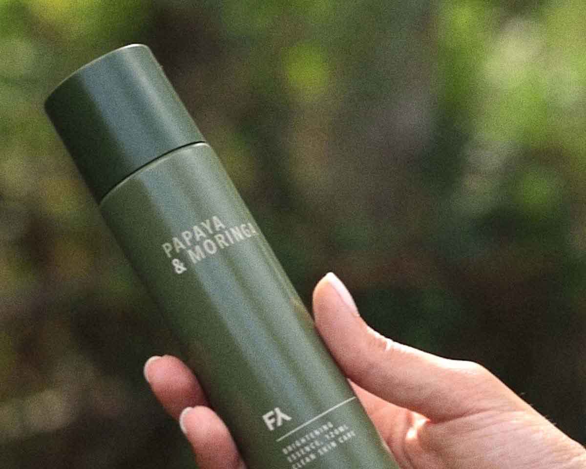 Cover image of the going green article about the rise of sustainable skincare showing fields of yarrow sustainable product