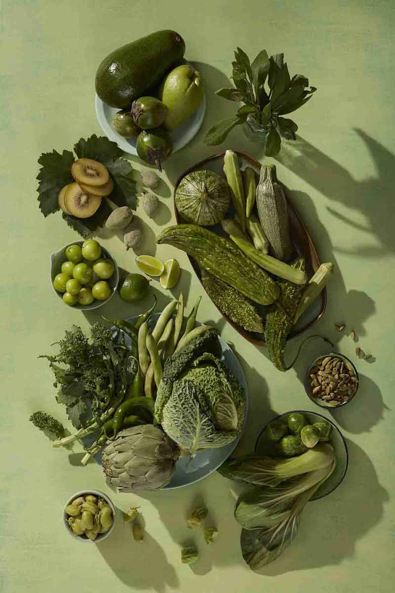 decorative image featuring various superfoods in a green tonality