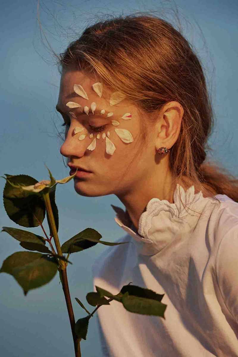 decorative image of a young woman using natural ingredients to prevent fine lines and wrinkles