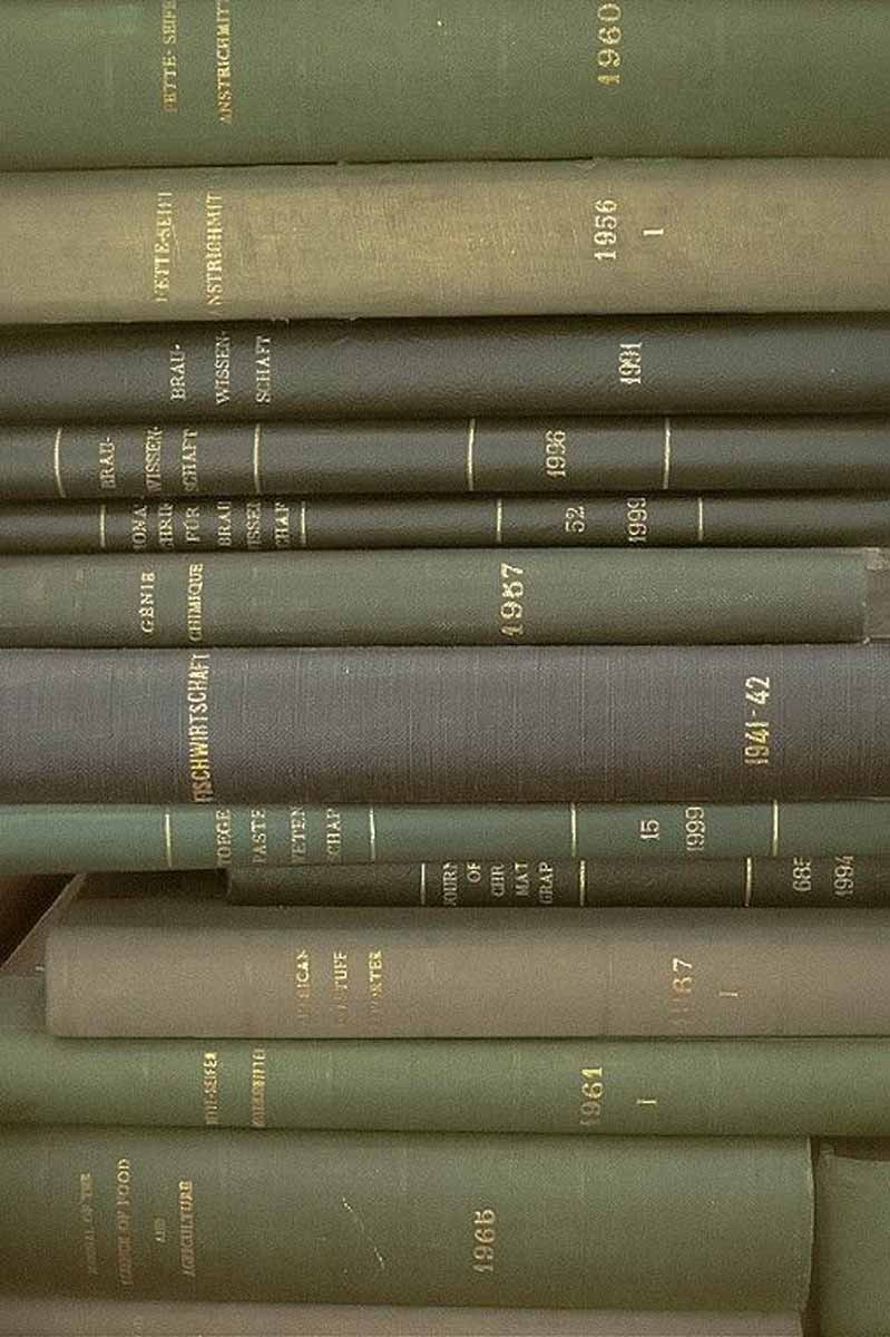 picture of a pile of green books