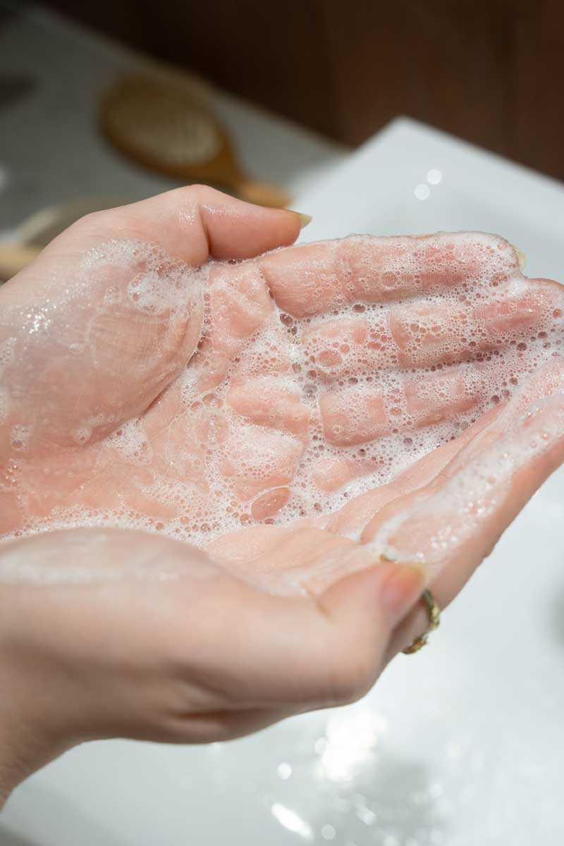 woman washing her hands