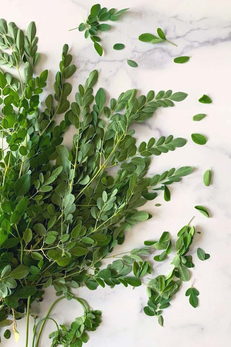 image of a woman using botanical products for eye care